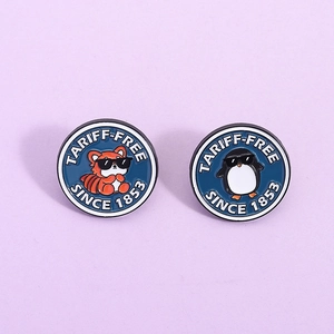 Cartoon enamel pins set featuring raccoon and penguin with sunglasses on blue round badges