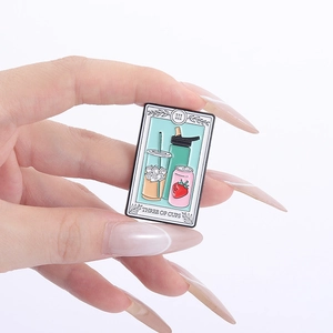 Detail of Three of Cups tarot pin featuring colorful modern beverage drink illustrations
