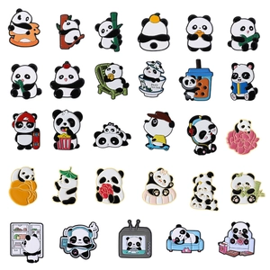 Collection of 29 cute cartoon panda enamel pins featuring various creative poses