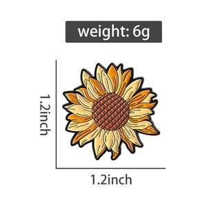Vue détaillée de la broche tournesol en émail montrant les dimensions et le poids