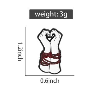 Detail view of heart-shaped hands enamel brooch with red rope ties and size dimensions