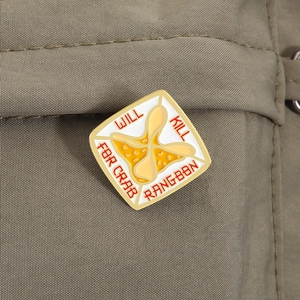 Creative Crab Rangoon enamel pin badge on olive green jacket with Will Kill For text