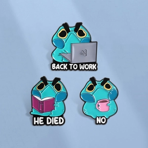 Detailed view of three grumpy frog enamel pins with humorous work and reading themes