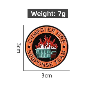Detail view of 3cm Dumpster Fire Response Team enamel pin with dimensions and 7g weight
