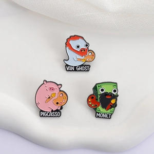 Ensemble de broches émaillées avec motifs Van Ghost, Pigcasso et Monet sur fond blanc