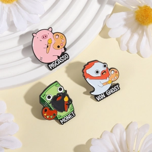 Détail des épingles en émail Pigcasso, Van Ghost et Monet avec des détails de peinture