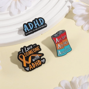 Enamel pins set for ADHD and Autism awareness with creative battery and ribbon designs