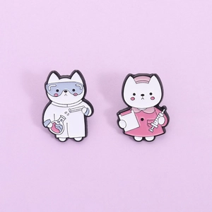 Detailed close-up of cute cartoon cat doctor and scientist enamel pins on purple background