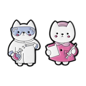 Cartoon enamel cat pins featuring science lab researcher and nurse cat designs for medical workers