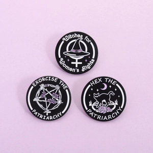 Three enamel witch pins set with Witches for Women's Rights and Hex the Patriarchy slogans