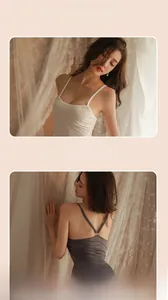 Detail of sheer white U-neck top and grey backless lingerie with criss-cross straps