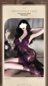 Detail view of purple lace sheer nightgown with floral embroidery on a soft sofa