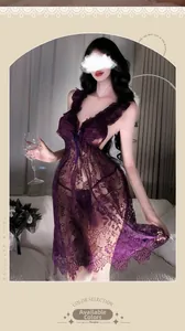 Detailed view of the sheer dark purple floral lace and eyelash trim on this sexy nightgown