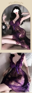 Detail of purple lace chemise featuring deep V-neckline and decorative silk bow