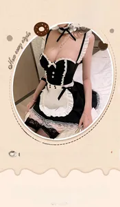 Detail of five-piece maid lingerie set including lace dress, apron and matching accessories
