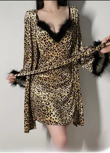 Detail of velvet leopard print nightgown with sexy faux fur trim and V-neck design