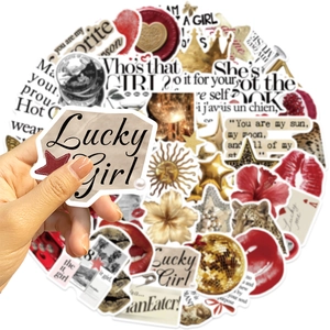 Detail of hand holding trendy vintage style waterproof stickers for DIY decoration