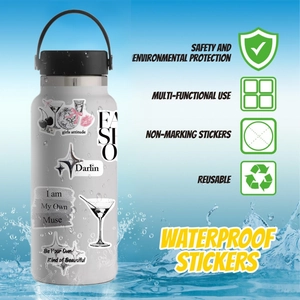 Waterproof silver stickers applied on a matte white insulated water bottle with black lid