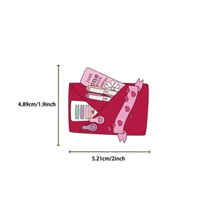 Detailed view of Bookish pink sticker showing pen pouch and 'just one more chapter' text