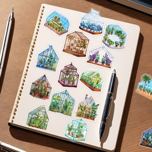 Detail of cartoon greenhouse plant stickers on a notebook with warm lighting
