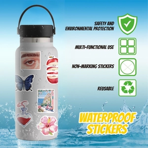 Waterproof Y2K aesthetic graffiti stickers on a white insulated water bottle with splash effect