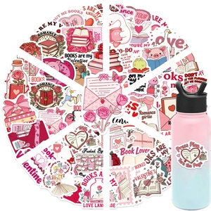 Close-up of pink Valentine Bookish stickers applied to a gradient blue water bottle