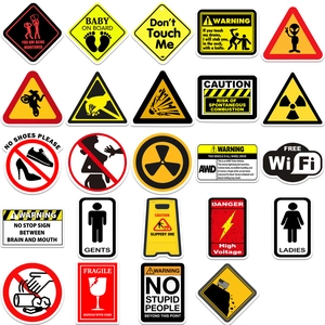 Close-up of assorted waterproof warning and security vinyl stickers for luggage and cars