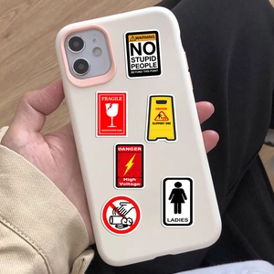 Pack of 50 durable waterproof industrial warning sign stickers on a white phone case