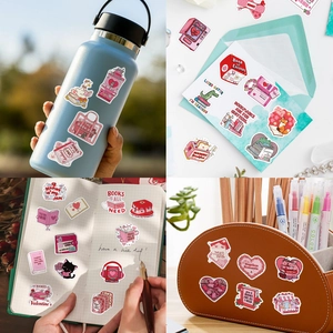 Pink Bookish Valentine stickers shown on a water bottle, envelope, and notebook