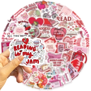 Close-up of pink bookish sticker featuring 'Reading is my jam' text and cute fox illustration