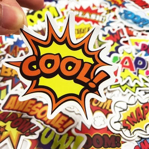 Close-up of comic pop art stickers with cool awesome and boom phrases for luggage