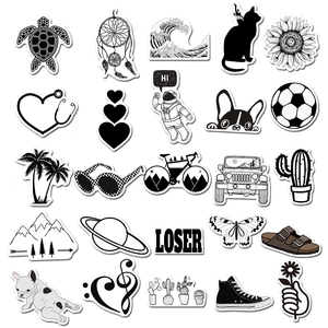 Detailed spread of black and white hand-drawn aesthetic stickers featuring nature and space