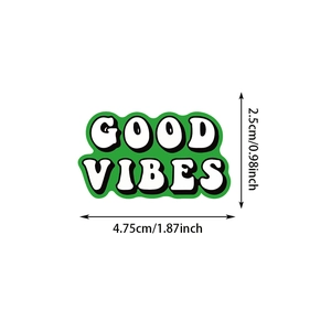 Detail view of Good Vibes sticker showing precise dimensions of 2.5cm by 4.75cm