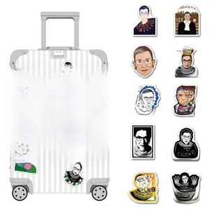Waterproof RBG stickers on a silver suitcase showing various artistic vinyl decals