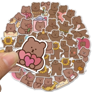 Close-up of cute Korean bear stickers featuring waterproof PVC material for DIY decor