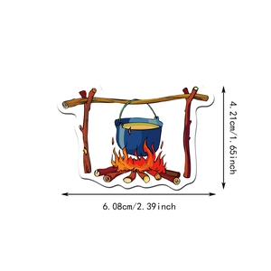 Detail view of campfire sticker dimensions showing 6.08 cm width and 4.21 cm height