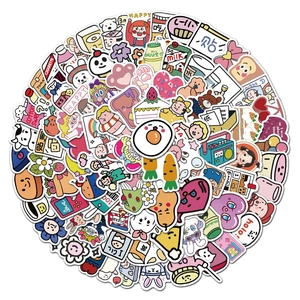 Close-up of cute cartoon stickers with animals and food for luggage and diary