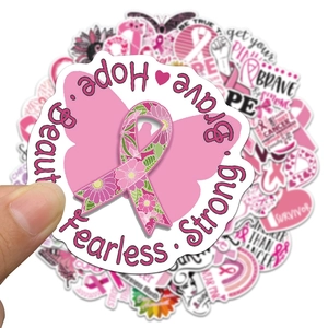 Pink ribbon stickers with Hope and Brave motifs for breast cancer awareness on laptop