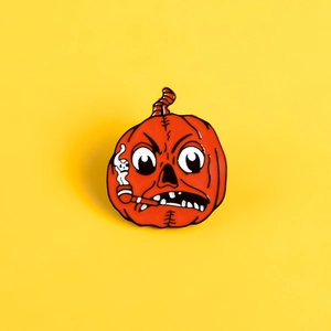 Vibrant Halloween orange pumpkin enamel brooch with angry face and smoking pipe detail