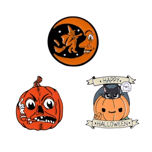 Three-piece Halloween enamel pins set featuring a witch, scary pumpkin, and black cat