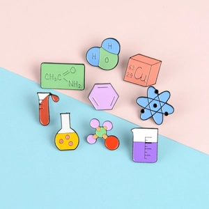 9pcs chemical science enamel pin set featuring flasks and atomic models on pink blue background