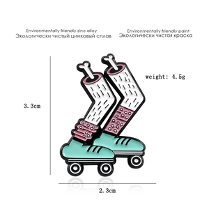 Detailed macro view of the roller skate enamel pin showing exact dimensions of 3.3cm by 2.3cm