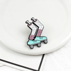 Creative cartoon roller skates enamel pin with leg design on white ceramic tray background