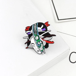 Macro shot of Japanese geisha enamel pin with artistic half-face mechanical design
