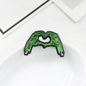 Skeleton hands heart gesture green enamel brooch pin with zombie stitching style