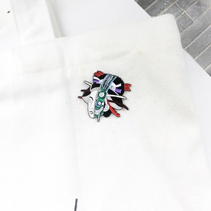 Japanese Geisha enamel pin with creative mechanical design on white canvas bag