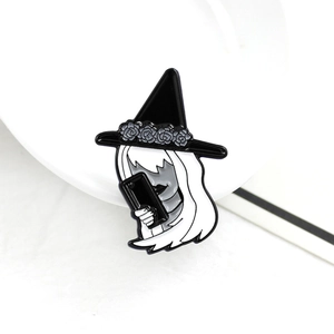 Gothic enamel brooch featuring a white-haired woman in a black hat with grey roses