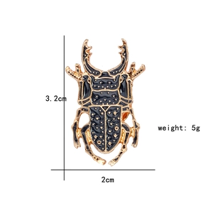 Detailed view of enamel beetle brooch with dimensions 3.2cm by 2cm and 5g weight info