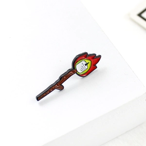 Detailed close-up of a toasted marshmallow on stick campfire enamel lapel pin