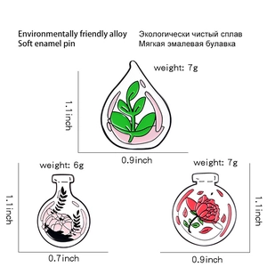 Enamel pins featuring magic bottles with fresh plants and flowers, sizing details